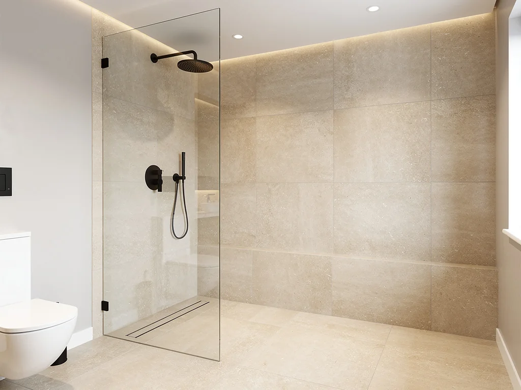 Douche à l'italienne carrelée et paroi vitrée dans une salle de bain claire
